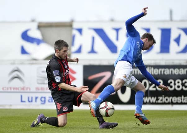 Glenavon's  Andy Hall in action with Crusaders' Craig McClean