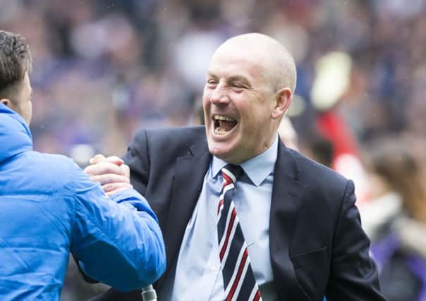 Rangers manager Mark Warburton celebrates