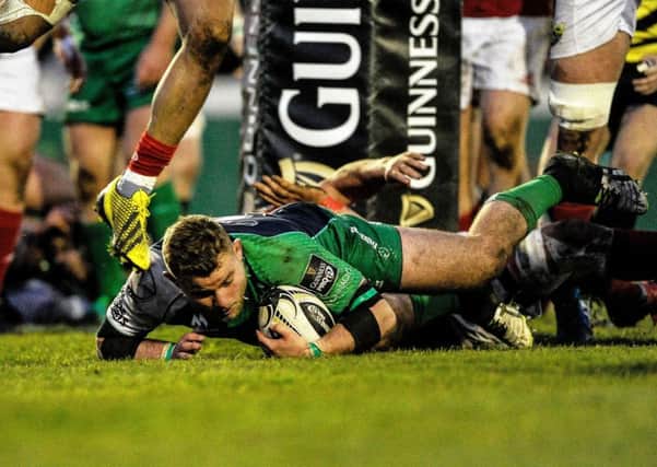 Connacht's Finlay Balham scores a try