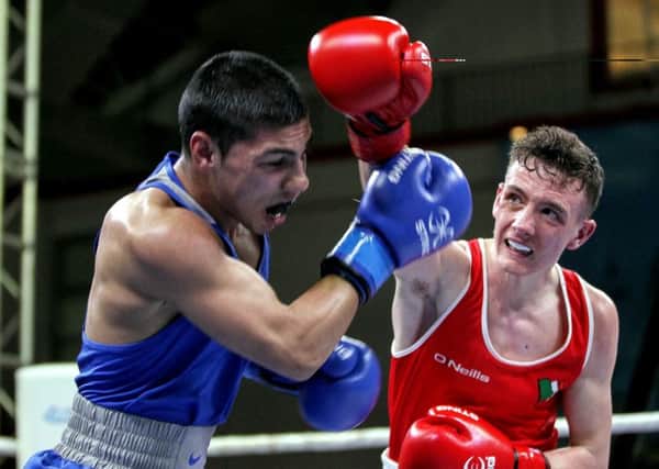 Brendan Irvine in action against Daniel Asenov of Bulgaria
