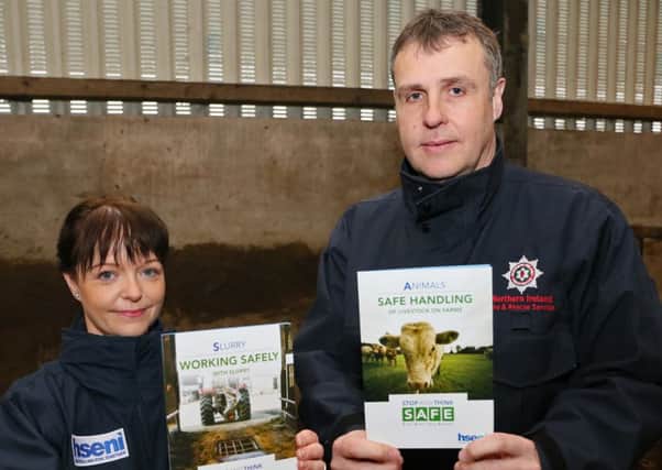 NIFRS Group Commander Fergal Leonard and HSENI Farm Safety Inspector Camilla Mackey pictured at Greenmount Agricultural College Antrim spreading slurry safety warning to the Farming Community.