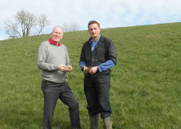 UGS Secretary George Reid (left) with host farm manager Cathal McAleer,
discussing details of the forthcoming farm visit