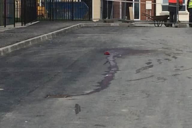 Blood marks the spot where the man was shot twice in the leg in the Magowan Estate in Creggan on Monday.