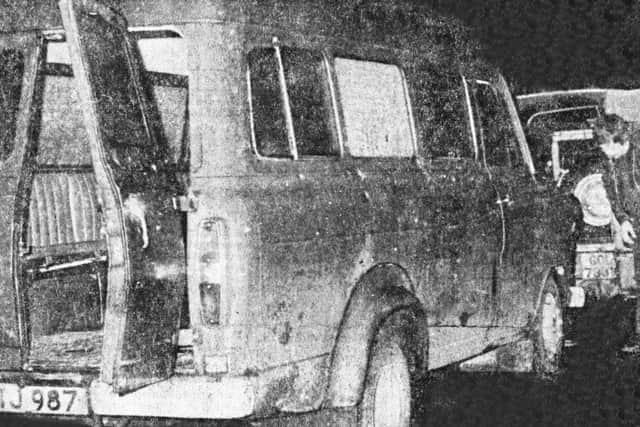 The bullet-riddled minibus in which the 10 murdered workers were travelling