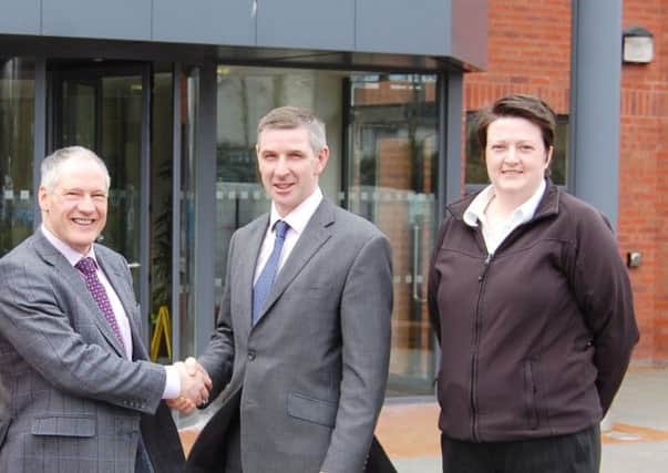 Moore Concrete's Wilbert Moore and Keri McGivern welcome UFU president Ian Marshall to the company's Ballymena factory