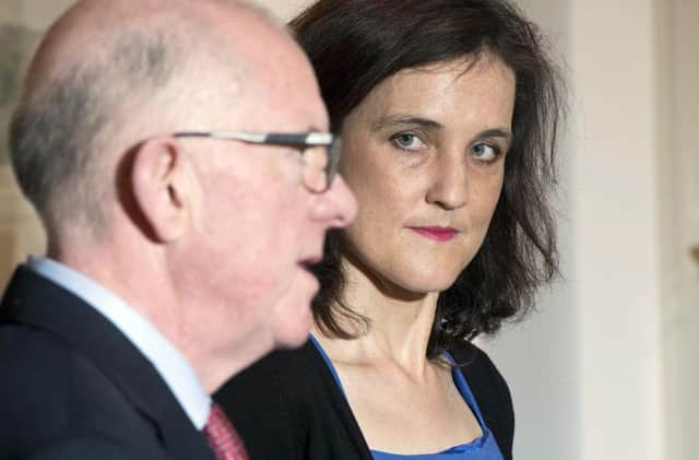Secretary of State Theresa Villiers has clashed with Charlie Flanagan
