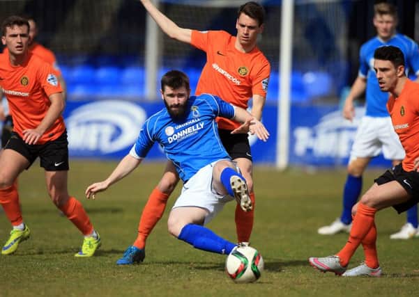 Dungannon Swifts  Cormac Burke   with Carrick Rangers   Mark Surgenor