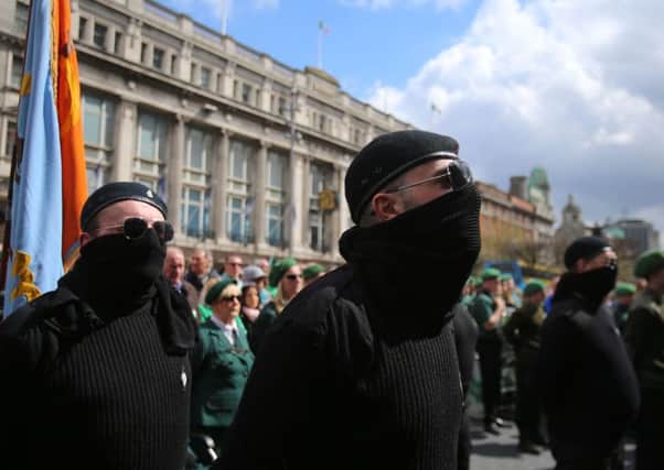 Members of Republican Sinn Fein march to the GPO on O'Connell Street in  Dublin, during a ceremony to mark the centenary of the 1916 Easter Rising. PRESS ASSOCIATION Photo. Picture date: Saturday April 23, 2016. Photo credit should read: Niall Carson/PA Wire