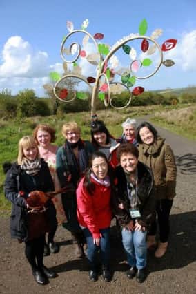 Louise Williamson (second from left) with local community crafters getting ready for Diamond Jubilee Woods Woollen Wood Grand Opening 2016