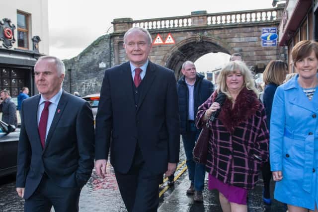Martin McGuinness (centre) with Raymond McCartney and Maeve McLaughlin after the launch of Sinn Fein's election manifesto in Londonderry
