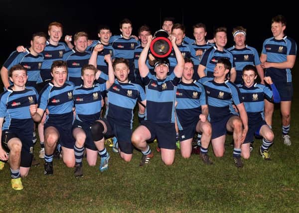 The victorious Dromore under 18 team following their 24-21 victory over Rainey in the Nutty Krust final