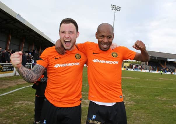 Carrick Rangers' 
Andrew Doyle and Miguel Chines celebrate.