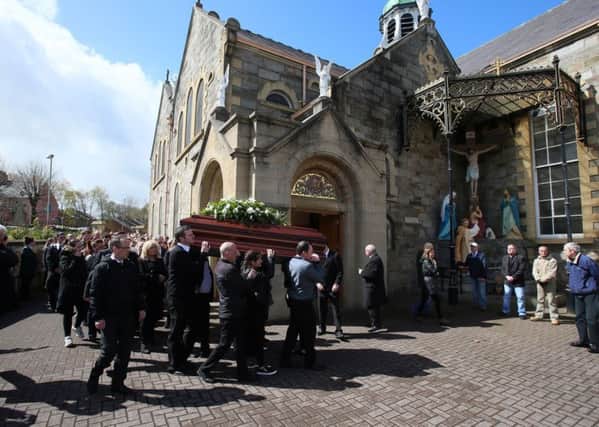 The coffin of Sister Clare Crockett, who was killed in an earthquake in Ecuador, is carried into Long Tower Church in Londonderry