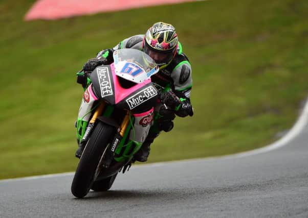 Andy Reid on the Quattro Plant Cool Kawasaki at Oulton Park.
