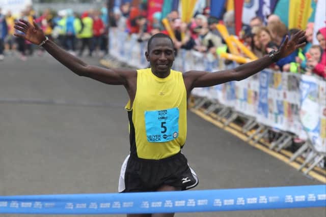 Joel Kositany wins the men's marathon
