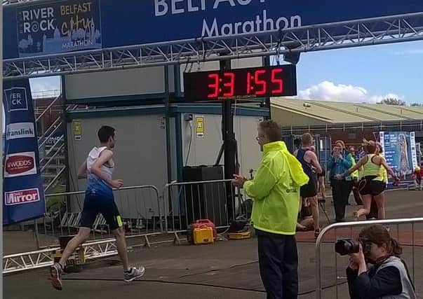 Liver transplant recipient Philip Cairnduff finishing his first Belfast Marathon in 2016