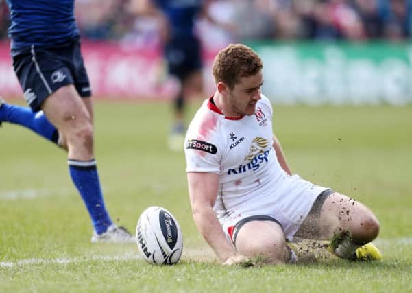 Paddy Jackson slides over for a late try against Leinster on Saturday