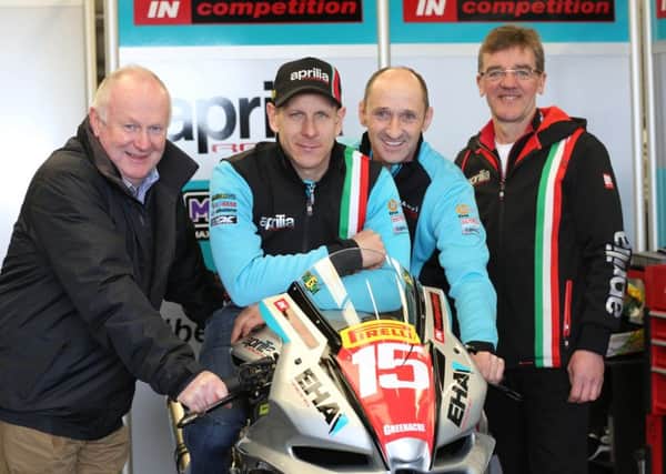 Ben Wilson with NW 200 Event Director Mervyn Whyte, Edward Allingham of EHA Racing and Ian Newton, Wilson's crew chief