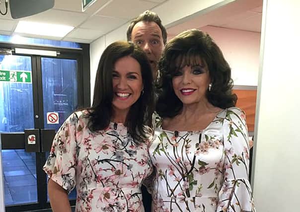 Screen grabbed image from the Twitter feed of @Joancollinsdbe of Dame Joan with Entertainment Editor Richard Arnold and Good Morning Britain host Susanna Reid, who suffered a wardrobe double-up