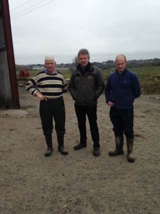 Barclay Bell visiting George and Andrew  Sloan at their family farm in Portadown, which has been affected by the adverse winter weather.
