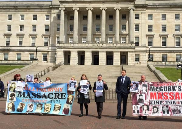 Families of those killed by the British Army in Ballymurphy in 1971 protest at a hold-up in implementing a judicial plan to speed up the process of hearing legacy inquests outside Parliament Buildings in  Stormont, Belfast