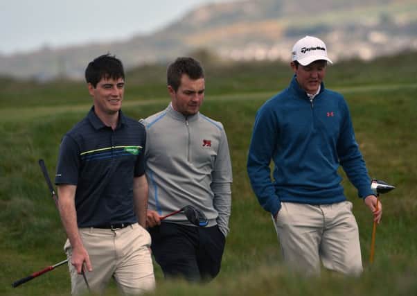 Jack Hume (Naas), Dermot McElroy (Ballymena) and John Ross Galbraith (Whitehead) during their practice of the 2016 Flogas Irish Amateur Open Championship at Royal Dublin Golf Club.