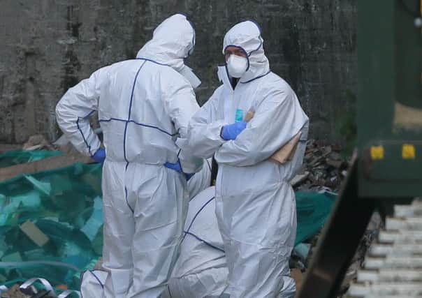 Forensic officers at the Greenstar recycling facility in Bray