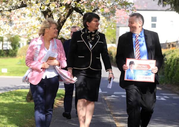 DUP Leader, Arlene Foster, with friend Rhona McMahon and party collegue Paul Robinson arriving at Brookeborough Controlled Primary School to cast her vote in today's  Assembly Election.