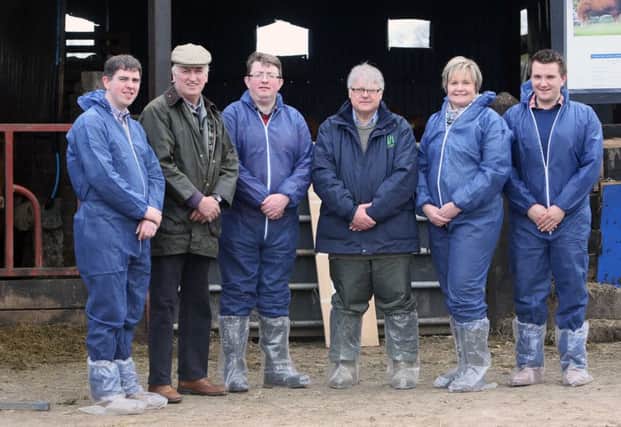 Host farmer Kenneth McKinstry, second left, with guest speakers at the AgriSearch farm walk near Magherafelt, which focused on using synchronisation in suckler herds. A topic that drew a crowd way beyond that expected. Only thanks to the quick action by nearby Loup GAA club was it possible to park all cars off the narrow roads.