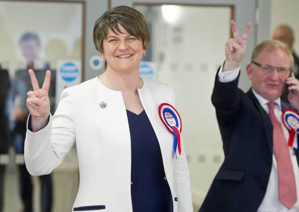 PACEMAKER PRESS 06/05/2016.  2016 Northern Ireland Assembly Election.  Votes are counted at Omagh Leisure centre as Voters took to the polls across Northern Ireland.  Pictured is DUP leader Arlene Foster with Lord Morrow.  PICTURE MARK MARLOW/PACEMAKER PRESS