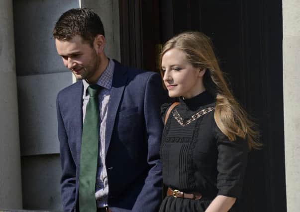 Daniel McArthur of Ashers and his wife Amy leave court after an earlier hearing