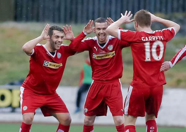 Davy McDaid (left) believes Cliftonville can kick on from their Europa League qualification