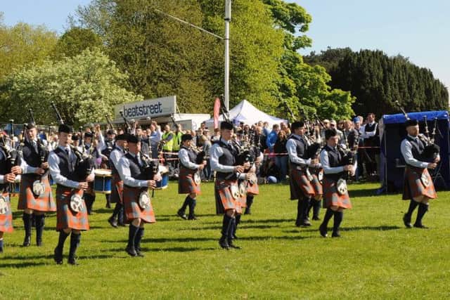 Pipe Major Nigel Davidson and Bleary and District Pipe Band pictured entering the competition arena at the Ards and North Down Pipe Band Championships at Castle Grounds, Bangor on Saturday 14th May.