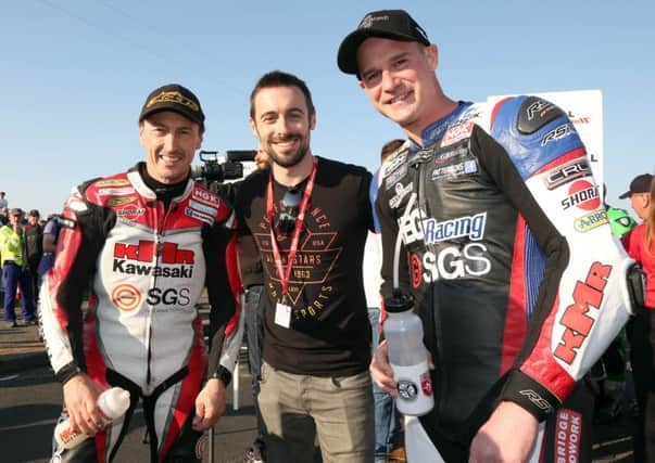 Jeremy McWilliams with MotoGP rider Eugene Laverty and Ryan Farquhar on Thursday at the North West 200.