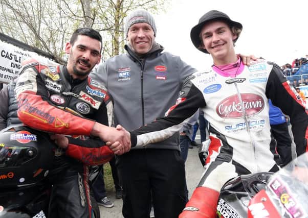 Cookstown B.E. Racing team owner John Burrows (centre) with Malachi Mitchell-Thomas (right) and Derek Sheils at the Cookstown 100 in April.