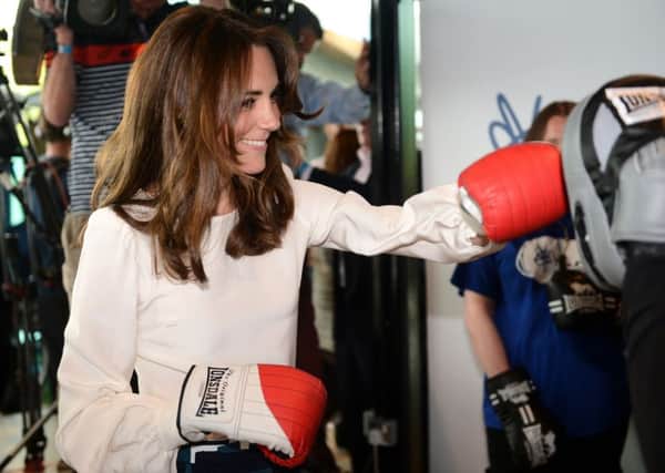The Duchess of Cambridge spars with former boxer Duke McKenzie (not pictured) at the Queen Elizabeth Olympic Park in east London, as she launches Heads Together with the Duke of Cambridge and Prince Harry - their new campaign to end mental health stigma