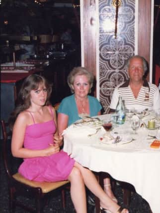 Jackie on holiday with her parents when she was a teenager