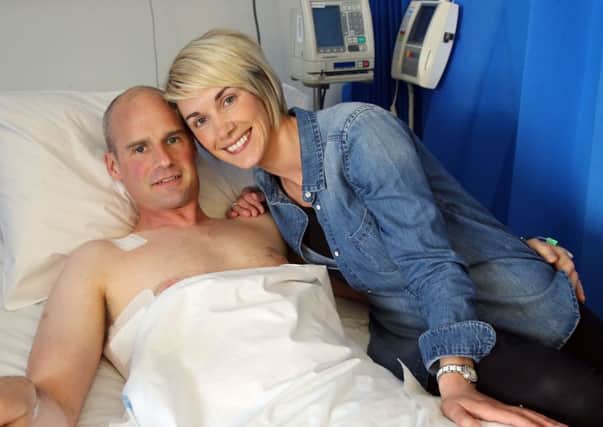 May 18, 2016: Ryan Farquhar with his wife Karen by his bedside