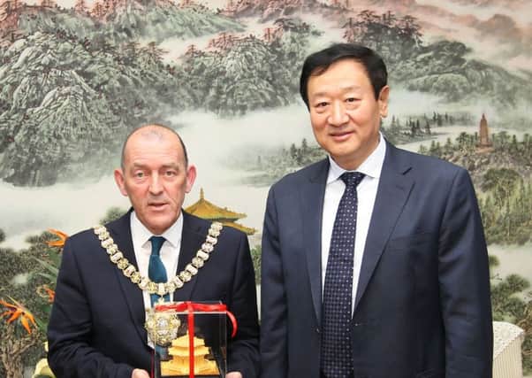Handout photo issued by Belfast City Council of Lord Mayor of Belfast Arder Carson (left) meeting with the Mayor of Shenyang Pan Liguo, as they sign a Sister City Agreement in Shenyang, China