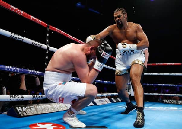 David Haye knocks down Arnold Gjergjaj in the second round of the Heavyweight contest at the O2 Arena