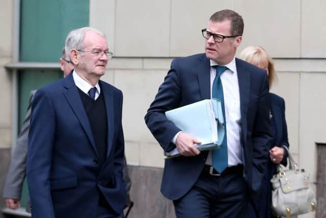 Alan Black (left), the only Protestant survivor of the Kingsmills massacre, arrives for the start of the inquest in Belfast