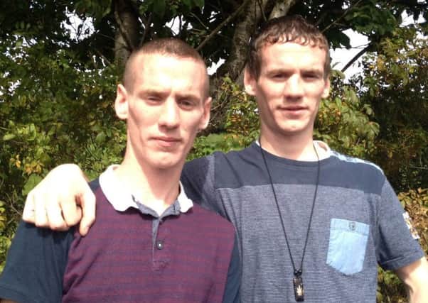 Murder victim Gerard Quinn (left) with his twin brother Michael who was injured in the altercation at the weekend