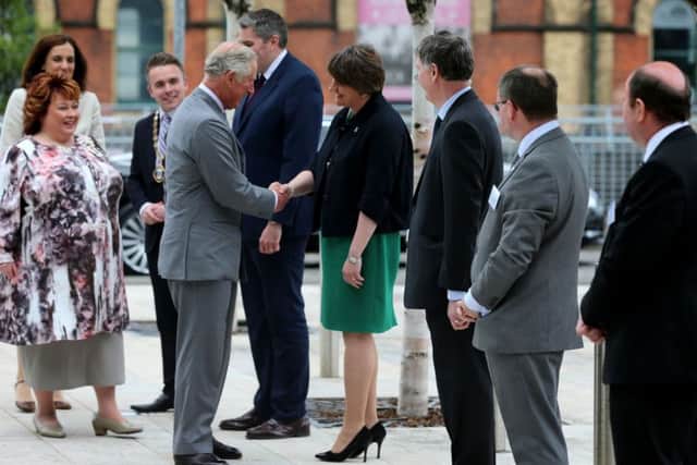 The Prince of Wales shakes hands with Northern Ireland First Minister Arlene Foster as he arrives at the Northern Ireland Science Park at Queen's University Belfast, where he officially launched the University's first Global Research Institute.  Photo: Niall Carson/PA Wire