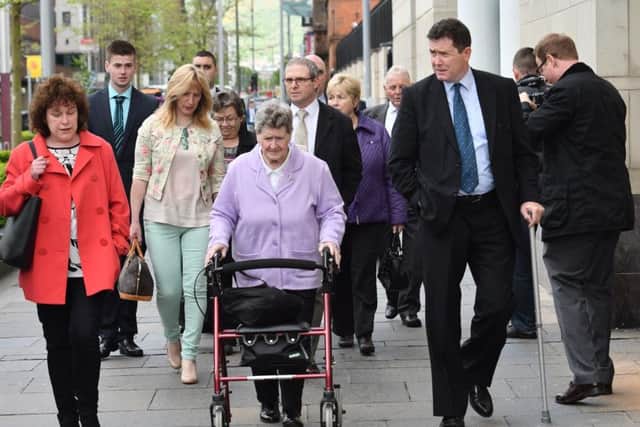 The families of many of the victims pictured at court