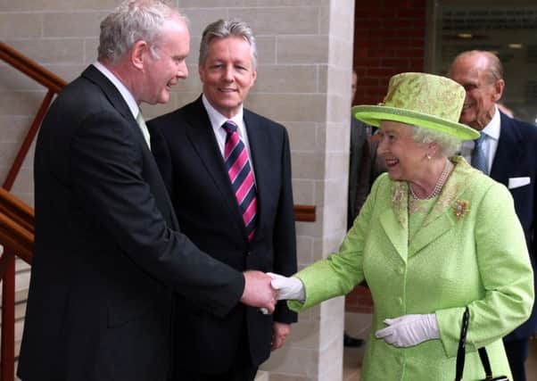 Reconciliation begins with gestures such as the Queen shaking hands with Martin McGuinness, as above in 2012, but it needs to move on to things such as confession. Photo: Paul Faith/PA Wire