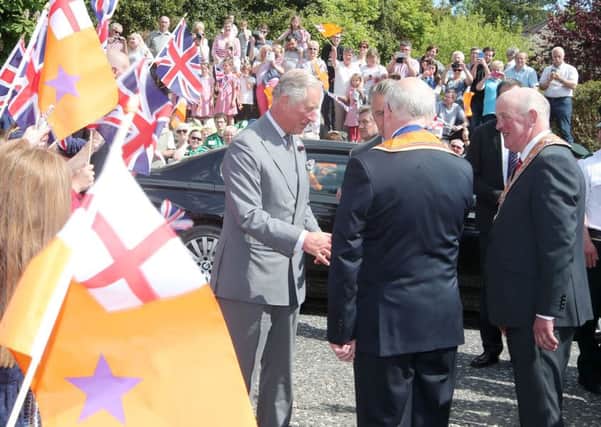 His Royal Highness The Prince of Wales continues his a two day visit to Northern Ireland by visiting Sloan House in Loughgall, Co. Armagh.  Sloan House is where the first Orange Order Lodge was formed in 1795 and has recently been resored and made into a community and visitors centre. Prince Charles is greeted by Ornage Order leaders and members of the local community as he arrives at the centre