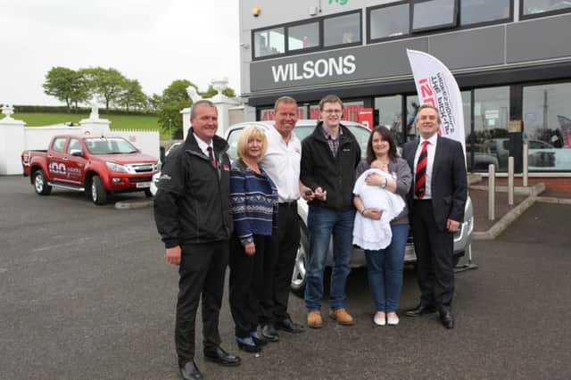 Alan Kennedy with his wife Joanne and baby Joshua with NIÂ Dealer Relationship Manager Alastair Kerr and Farming Life's Martine Lafferty. Also pictured is Michael Turtle, Isuzu Sales Manager from Wilsons of Rathkenny and Managing Director John Wilson.