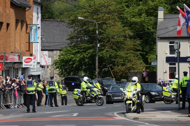 Gardai provide security as the Prince of Wales and the Duchess of Cornwall arrive in Donegal Town during a visit to solidify transformed Anglo-Irish relations.  PRESS ASSOCIATION Photo. Picture date: Wednesday May 25, 2016
