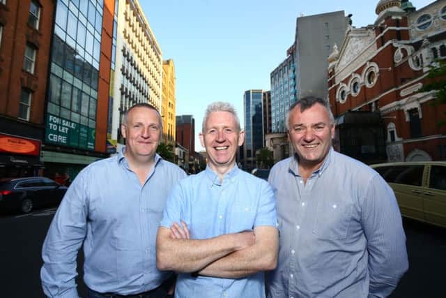 Patrick McAliskey, centre, with Jeremy Eakin,left, and James Leckey