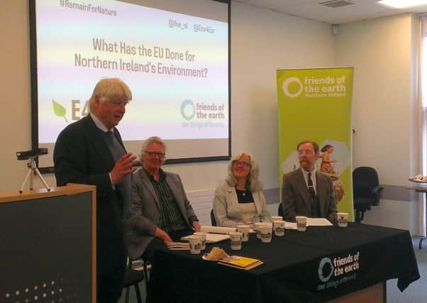 Stanley Johnson, left, James of Orr Friends of the Earth, Tanya Jones, Green Party NI and Declan Allison, FoE NI campaigner at Queen's University in Belfast on May 25. By Ben Lowry